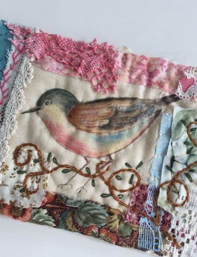 Hand-embroidered Textile Crafts and Paper Crafts with bird design and colorful fabric details