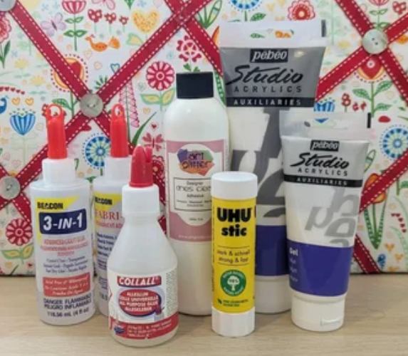 Essential Craft Tools: A Complete Guide for Beginners Essential Craft Tools including glue, acrylic paints, and craft supplies for DIY projects.