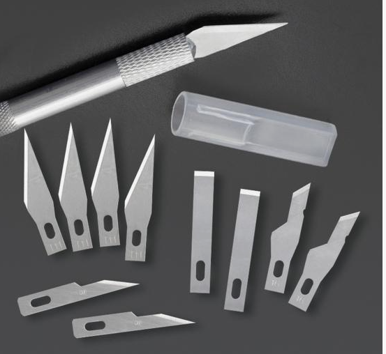 Basic Craft Materials: A Beginner’s Guide to Essential Craft Supplies Craft knife blades and essential cutting tools for basic craft materials.