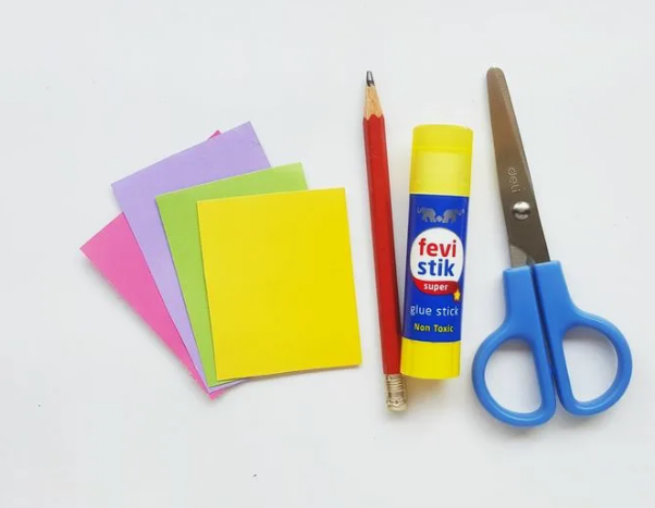 Basic Craft Materials: A Beginner’s Guide to Essential Craft Supplies Basic craft materials for beginners including colored paper, pencil, glue stick, and craft scissors