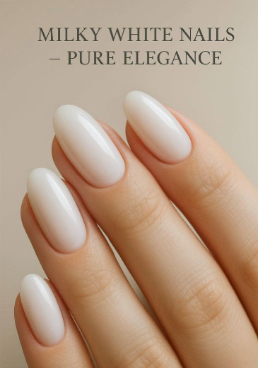 A close-up of a woman's hand with perfectly manicured glossy oval-shaped milky white nails against a neutral beige background, embodying pure elegance and featured on Humor Craze.