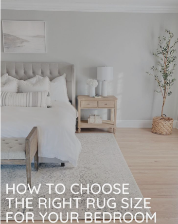 10 Cheap Ways to Make Your Home Look More Expensive A softly lit, elegant modern bedroom with a tufted gray headboard, neutral bedding, a wooden nightstand, and a light-colored area rug, illustrating how to choose the right rug size for your bedroom.
