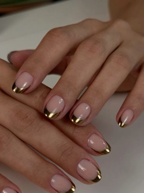 25 Short Fall Nail Ideas for 2026: Chic, Simple & Trendy Designs Short fall nail ideas 2026 showcasing short, rounded nails styled with glossy metallic gold French tips over a neutral base.