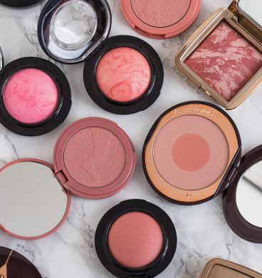 20 Types of Makeup and Their Uses: A Complete Beginner’s Guide Collection of popular powder blushes in various shades and compacts for types of makeup and their uses.