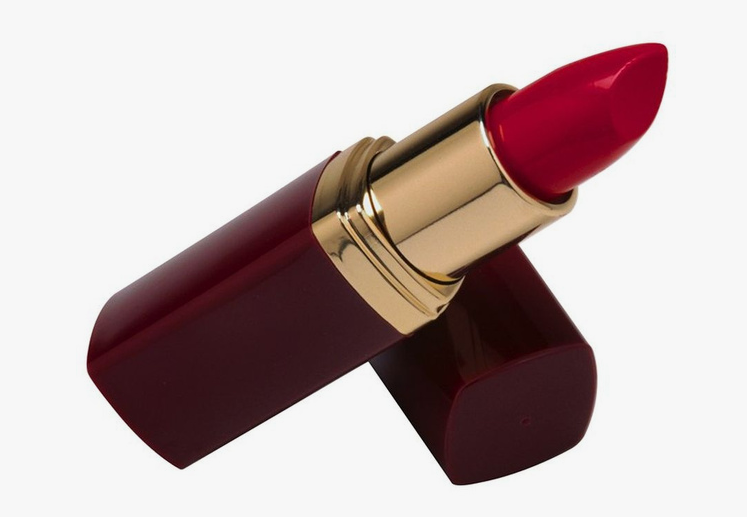 20 Types of Makeup and Their Uses: A Complete Beginner’s Guide Open tube of vibrant red lipstick in a sleek dark red and gold case for types of makeup and their uses.