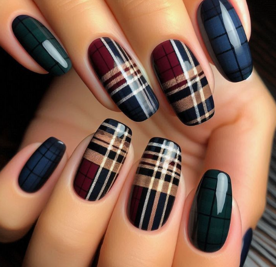 18 Back-to-School Nail Designs for a Fresh Start This School Year Close-up of stylish back-to-school nail designs featuring sophisticated tartan and plaid patterns in rich autumn colors like burgundy, dark green, navy blue, and tan.