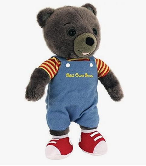 20 DIY Crafts With Old Clothes That Are Easy to Make A cute plush teddy bear wearing miniature blue overalls and red shoes, showcasing creative DIY crafts with old clothes and recycled fabric plush toys.