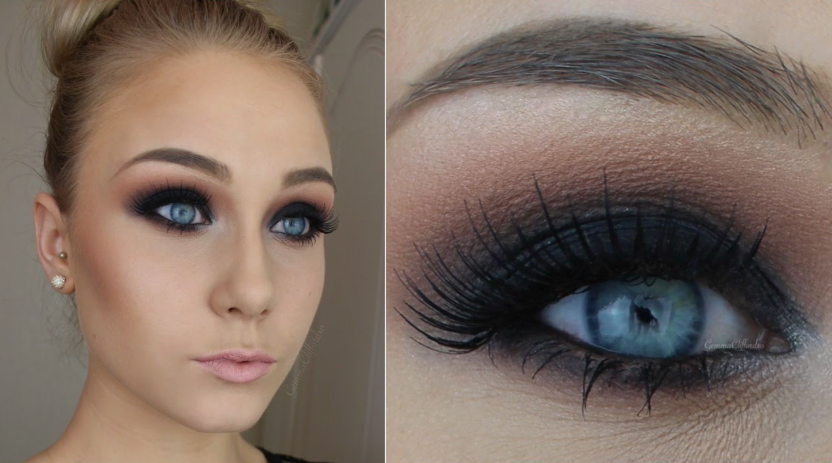 Demonstrating which makeup look is trending now, featuring a dramatic soft smoky liner and dark sultry eyeshadow look paired with bright blue eyes.