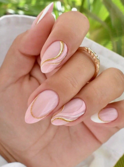 24 Sunflower Nail Ideas for a Bright, Cheerful Manicure sunflower nail ideas featuring almond-shaped nails with a sheer pink base, styled with elegant gold glitter swirls, fine white linework, and a classic white tip on the outer finger.