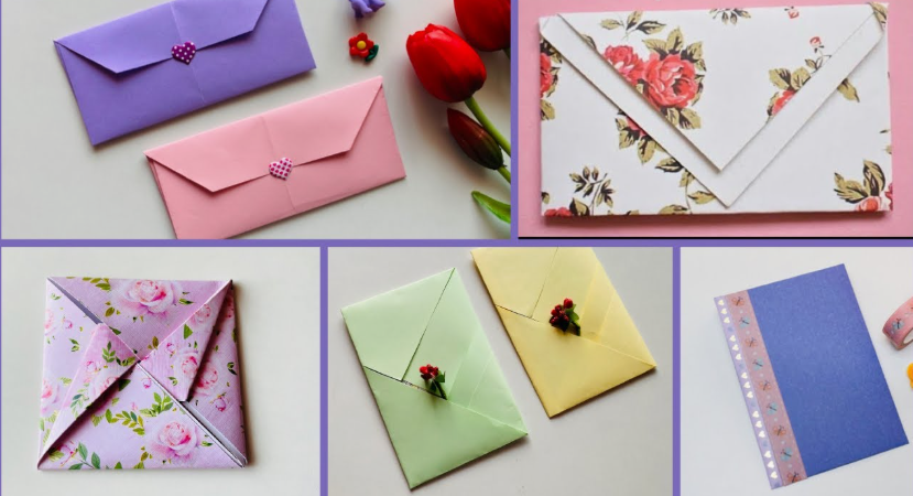 A collection of handmade paper envelopes in various styles, including solid purple and pink envelopes sealed with tiny heart embellishments, floral patterned envelopes with folded geometric flaps, light green and yellow envelopes decorated with miniature flower accents, and a blue envelope accented with decorative washi tape.