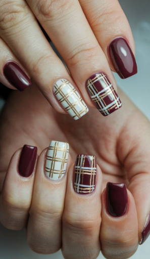 Glossy oval-shaped burgundy nail designs featuring a rich, luminous dark red gel finish with a subtle depth dimension.