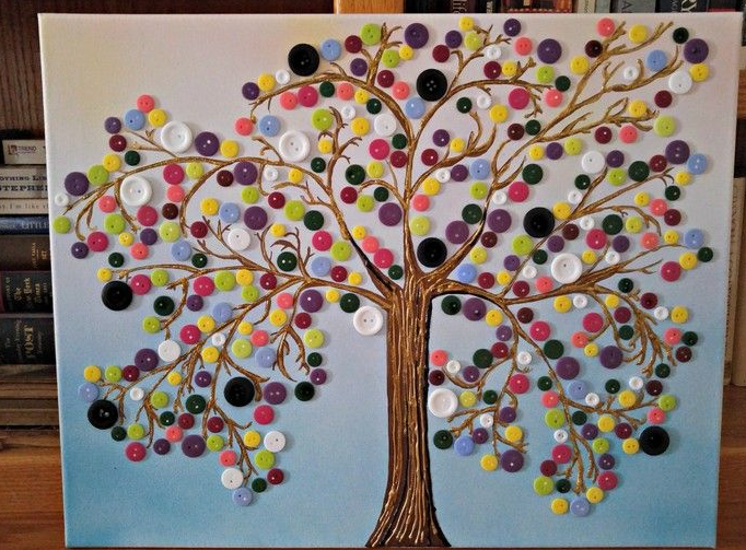30 Creative DIY Button Crafts to Turn Spare Buttons Into Beautiful Decor A stunning canvas painting of a large tree with a painted golden-brown trunk and branches, adorned with a colorful canopy of multi-colored buttons acting as leaves, showcasing DIY button crafts.