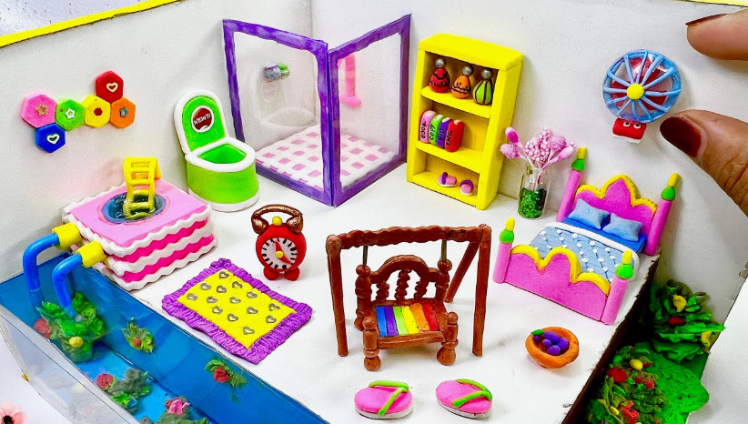 A miniature dollhouse room filled with colorful furniture and decor, demonstrating imaginative air dry clay ideas for miniature crafts and dioramas.