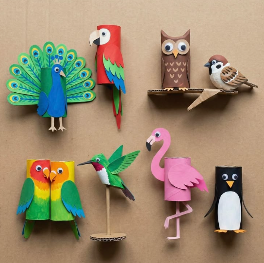 50+ Easy DIY Crafts to Sell and Make Extra Money Easy DIY crafts to sell: A collection of colorful bird crafts made from toilet paper rolls, including a peacock, parrot, owl, sparrow, lovebirds, hummingbird, flamingo, and penguin.