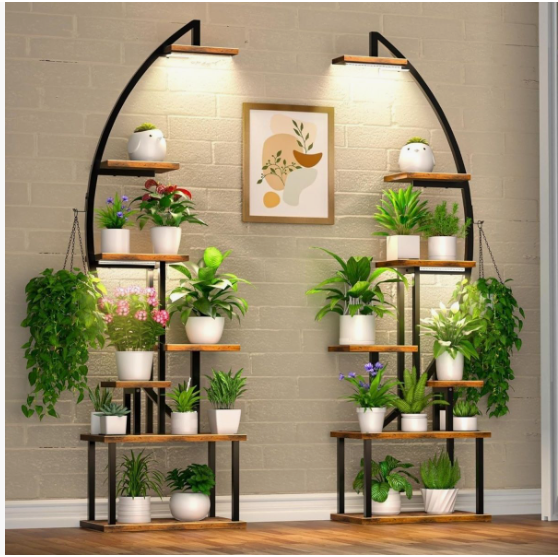 50+ Easy DIY Crafts to Sell and Make Extra Money Easy DIY crafts to sell: Two tall, arched plant stands with metal frames and wooden shelves holding various potted plants, equipped with built-in grow lights at the top, and positioned against a brick wall on either side of a framed abstract print.