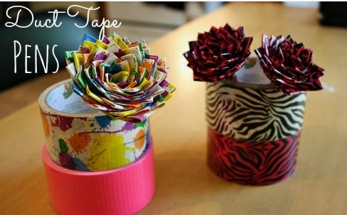 50+ Easy DIY Crafts to Sell and Make Extra Money Easy DIY crafts to sell: Handmade decorative pens topped with intricate duct tape flowers shaped like roses, displayed in rolls of colorful and patterned duct tape.