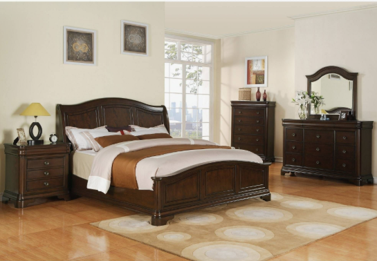 Small Living Room Decor Ideas on a Budget: 25 Stylish Ways to Make It Look Expensive Traditional dark wood bedroom suite featuring a sleigh bed, matching nightstand, chest of drawers, and dresser with an arched mirror, styled with small living room decor ideas on a budget.