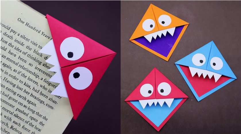 A red triangular corner bookmark shaped like a funny monster with white teeth peeking out of a book page for DIY crafts using things you have at home.