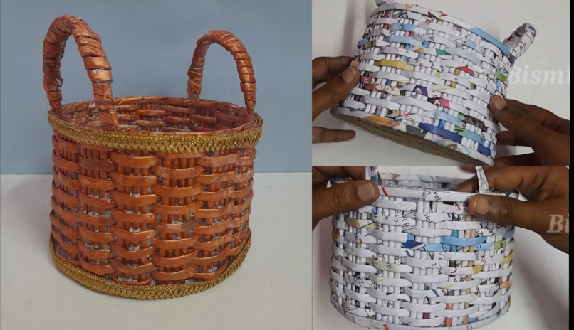 A woven basket crafted from rolled newspaper tubes and painted with a glossy orange finish with gold trim, highlighting DIY crafts using things you have at home.