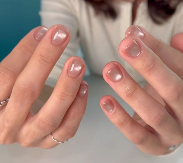 Glossy magnetic cat-eye short square nude nails showcasing low-maintenance nail designs.