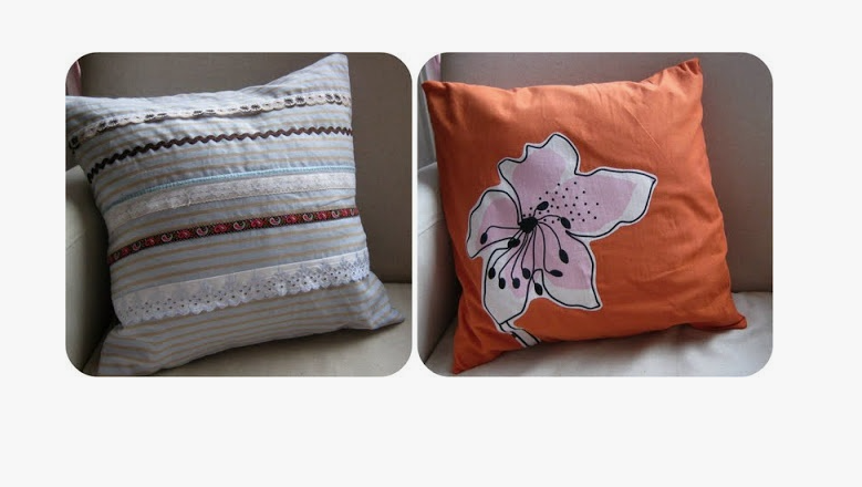 A striped fabric cushion decorated with horizontal rows of lace, ribbon, and rickrack trim.