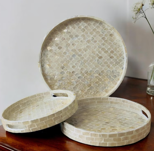 A set of decorative round mosaic trays showcasing elegant air dry clay ideas for custom home decor and organizational trays.