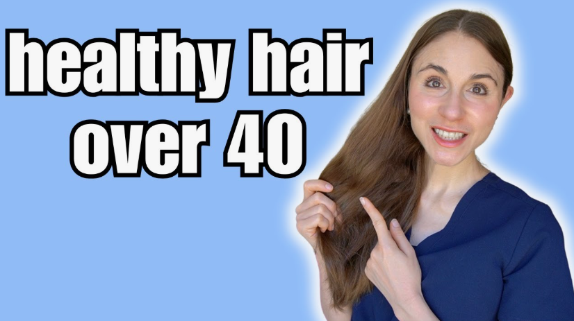 A smiling woman pointing to her long brown hair with text overlay reading "healthy hair over 40," showcasing beauty tips for women over 40.