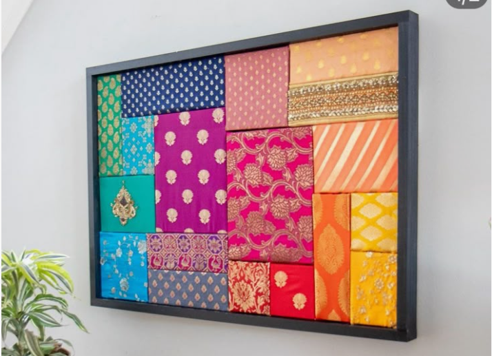 20 No-Sew DIY Crafts for Adults Large framed wall art featuring a vibrant patchwork collage of colorful patterned Indian fabrics and textiles in shades of blue, magenta, pink, orange, and gold, showcasing an inspiring no-sew DIY craft for adults.
