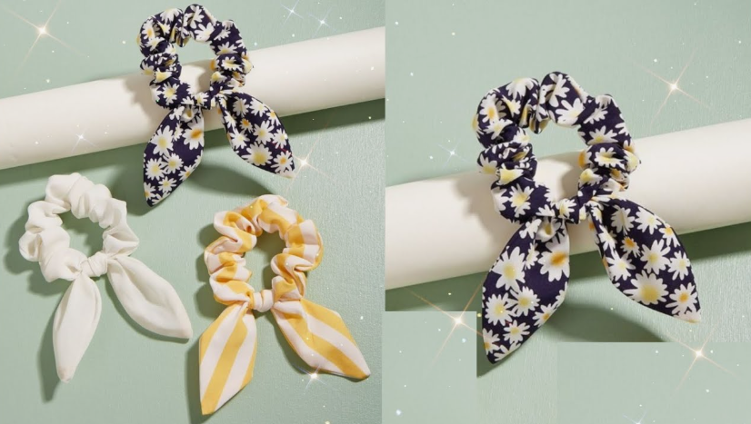 20 No-Sew DIY Crafts for Adults Display of four cute fabric hair scrunchies featuring solid white, yellow-and-white stripes, and dark floral daisy patterns with bunny ear ties, showcasing charming no-sew DIY crafts for adults.