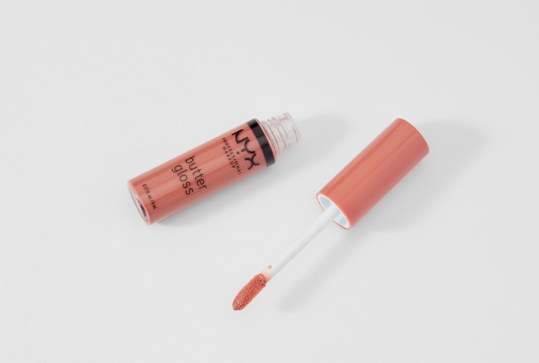 Open tube and applicator wand of NYX Professional Makeup Butter Gloss in a neutral pink shade against a clean white background, highlighting best drugstore beauty products under $20.