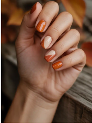 25 Short Fall Nail Ideas for 2026: Chic, Classy & Easy Designs Short fall nail ideas featuring glossy burnt orange and nude color-blocked geometric accent nails on short square nails.