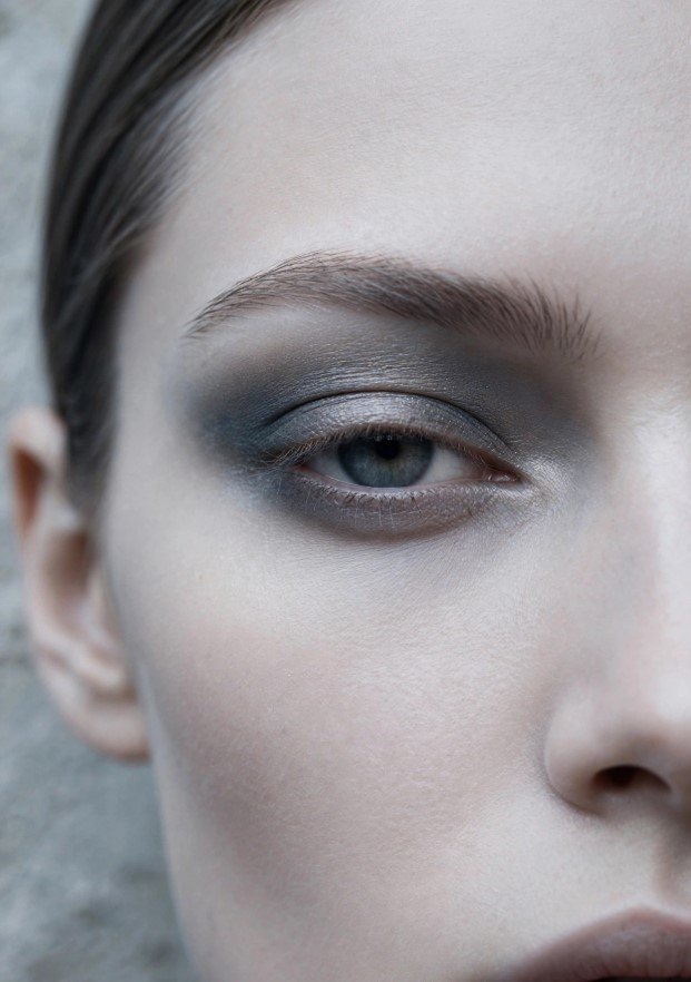 Cool-toned smoky eye with charcoal blending and satin finish for edgy makeup looks ideas.   