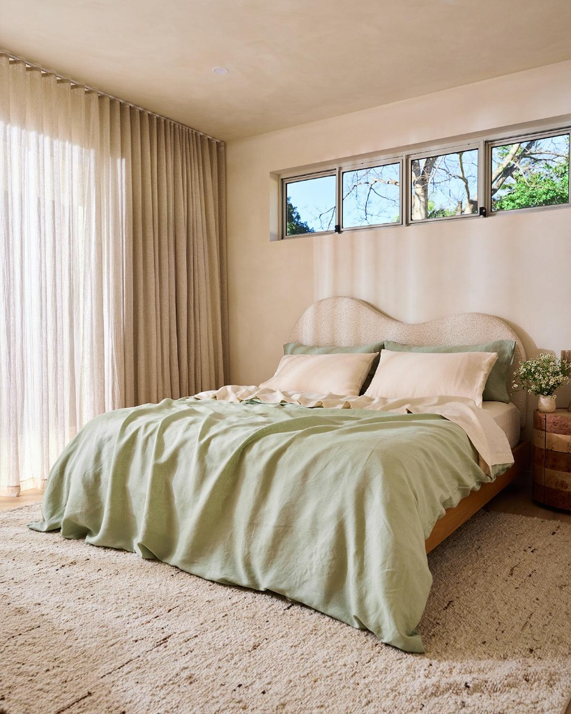 Bedding Set Ideas 2026: 15 Stylish Looks for Your Bedroom Sage green linen duvet cover and cream pillowcases showcasing bedding set ideas 2026 in a sunlit modern minimalist bedroom.